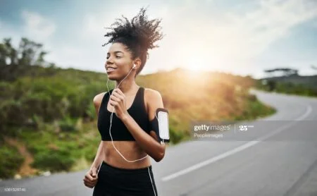 Shot of a sporty young woman running outdoors